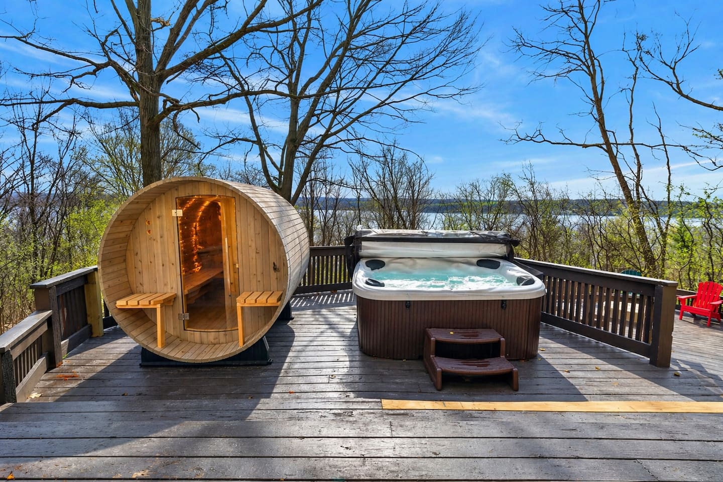 Enjoy your private outdoor spa with hot tub and sauna overlooking beautiful Canandaigua Lake—soak, steam, and relax surrounded by nature, fresh air, and peaceful views, creating the perfect retreat for unwinding any time of day