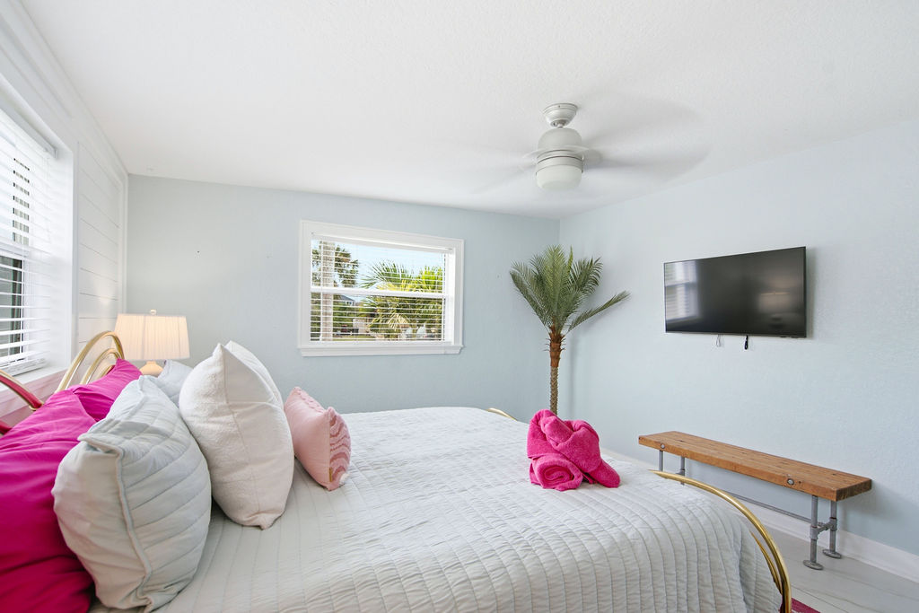The king bed and smart TV in bedroom three