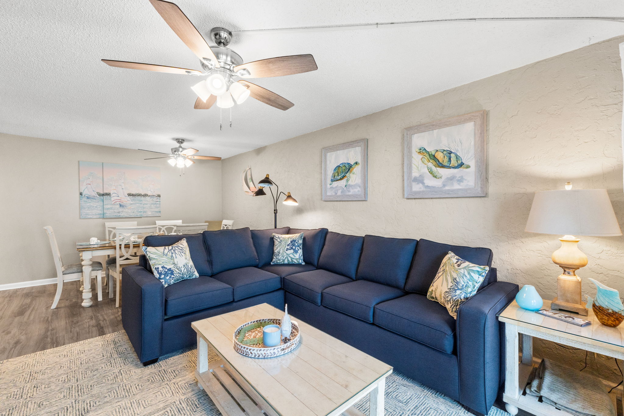 Living Room with Queen Sized Sleeper Sofa and Balcony Access