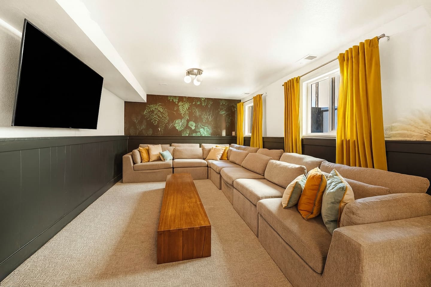 Stylish lounge with extra large sectional and vintage design perfect for gatherings.