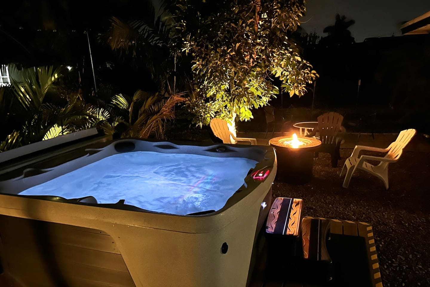 Epic Outdoor Living Area, With Hot Tub, Gas Fire Pit, Grill, and Cornhole. There's plenty to do here without even leaving. Or spend a relaxing night in the hot tub, finished off with a drink by the fire!