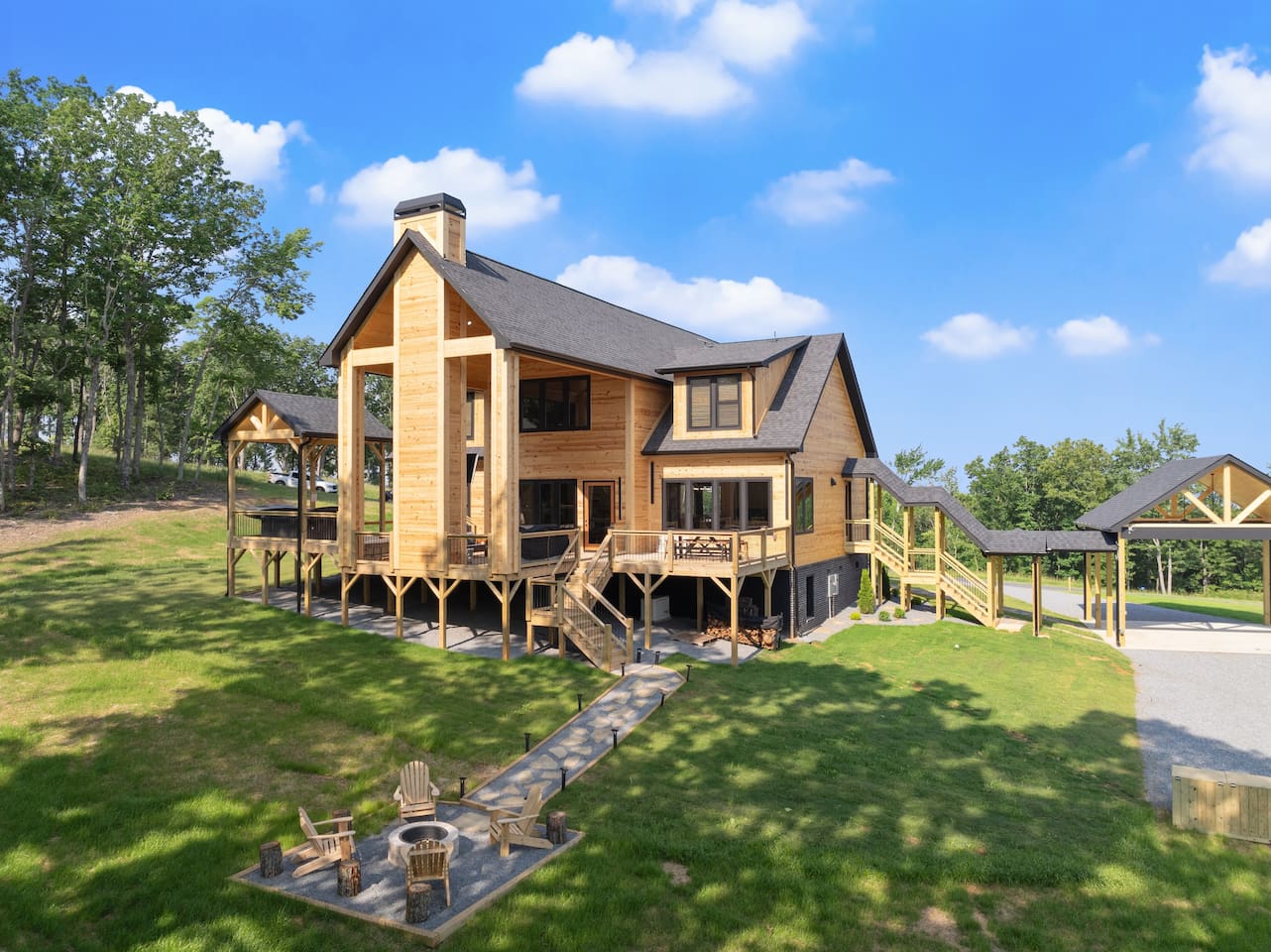 Framed by lush greenery and open skies, this final angle showcases the home’s seamless blend with its environment.