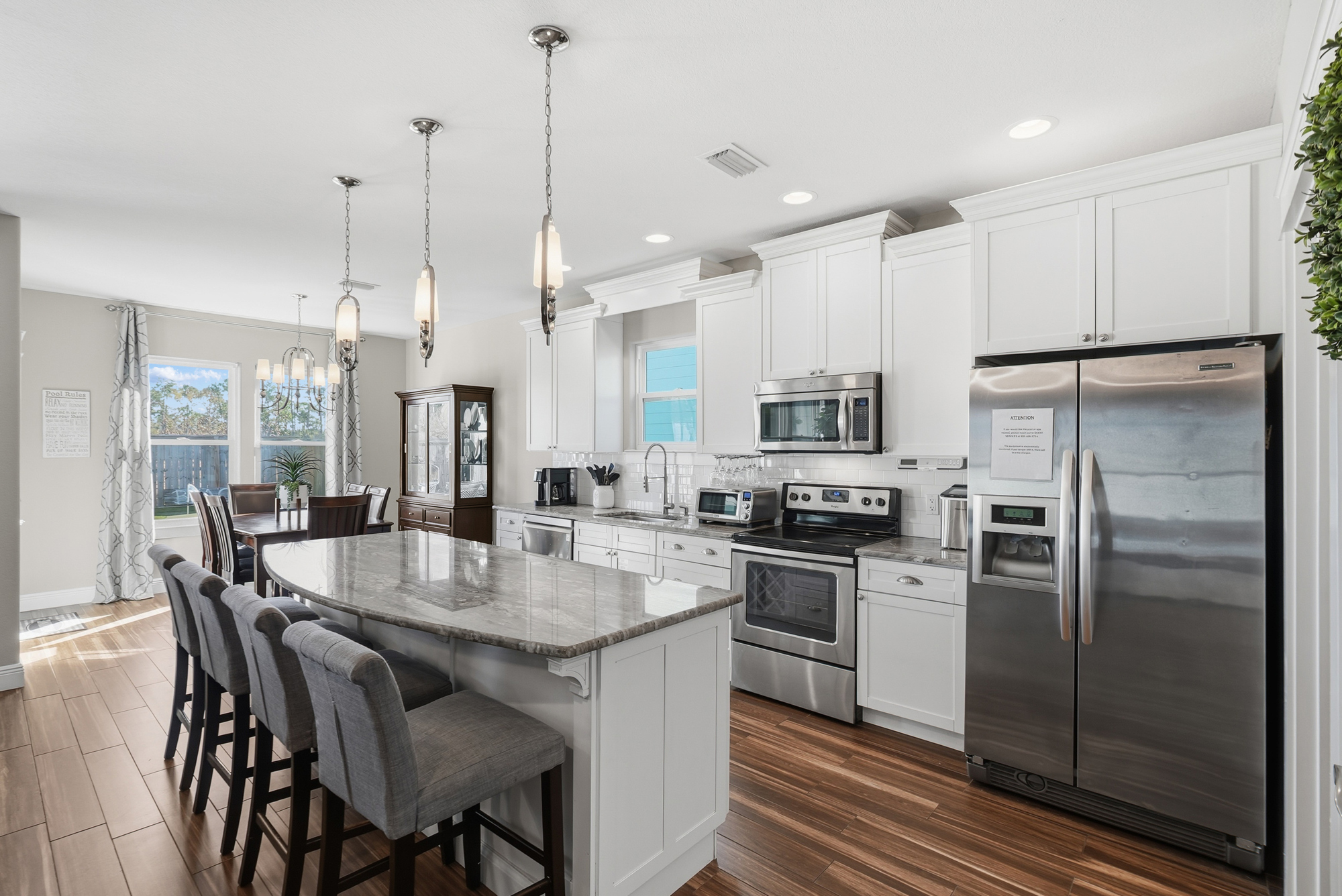 Modern fully equipped kitchen with ample counter space for cooking vacation meals.