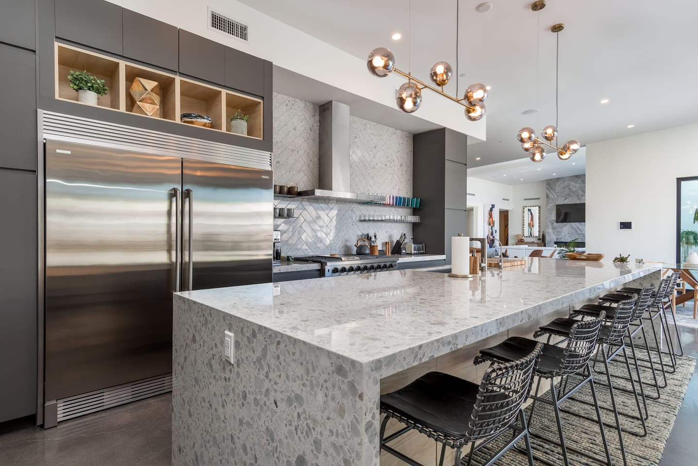 Fully outfitted gourmet kitchen - with Thor range, two ovens, griddle and six burners.