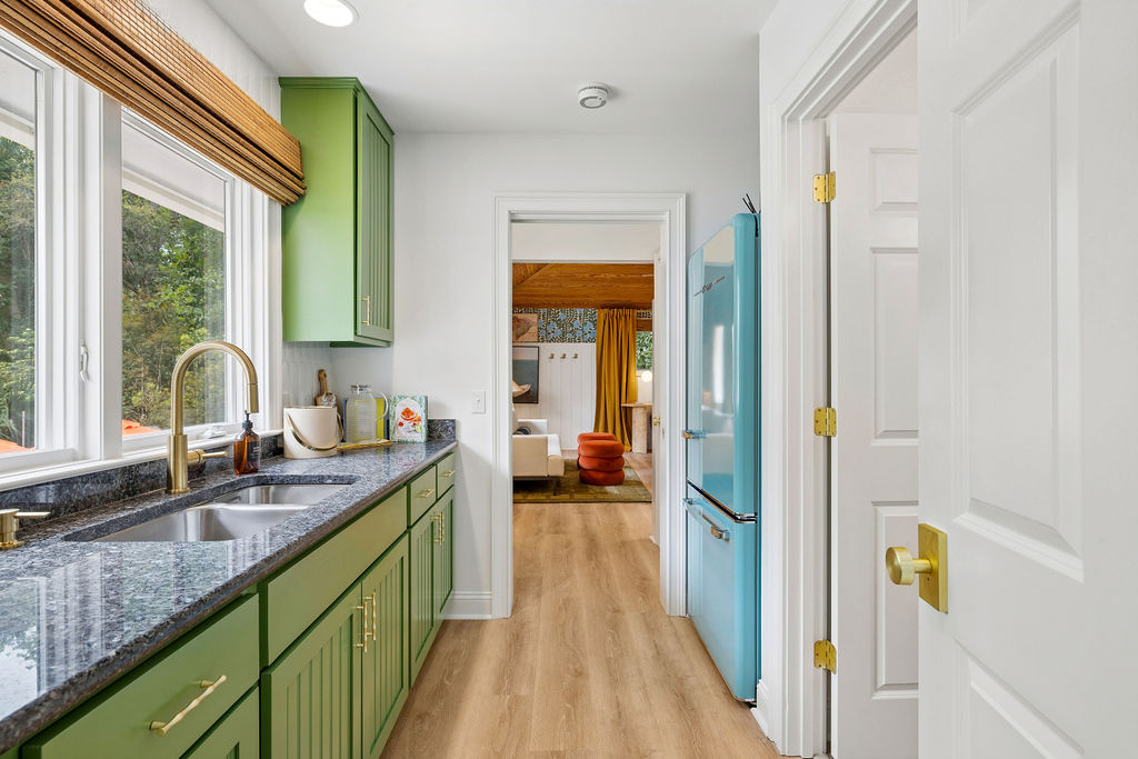 Our in-law suite features its own kitchenette with retro fridge