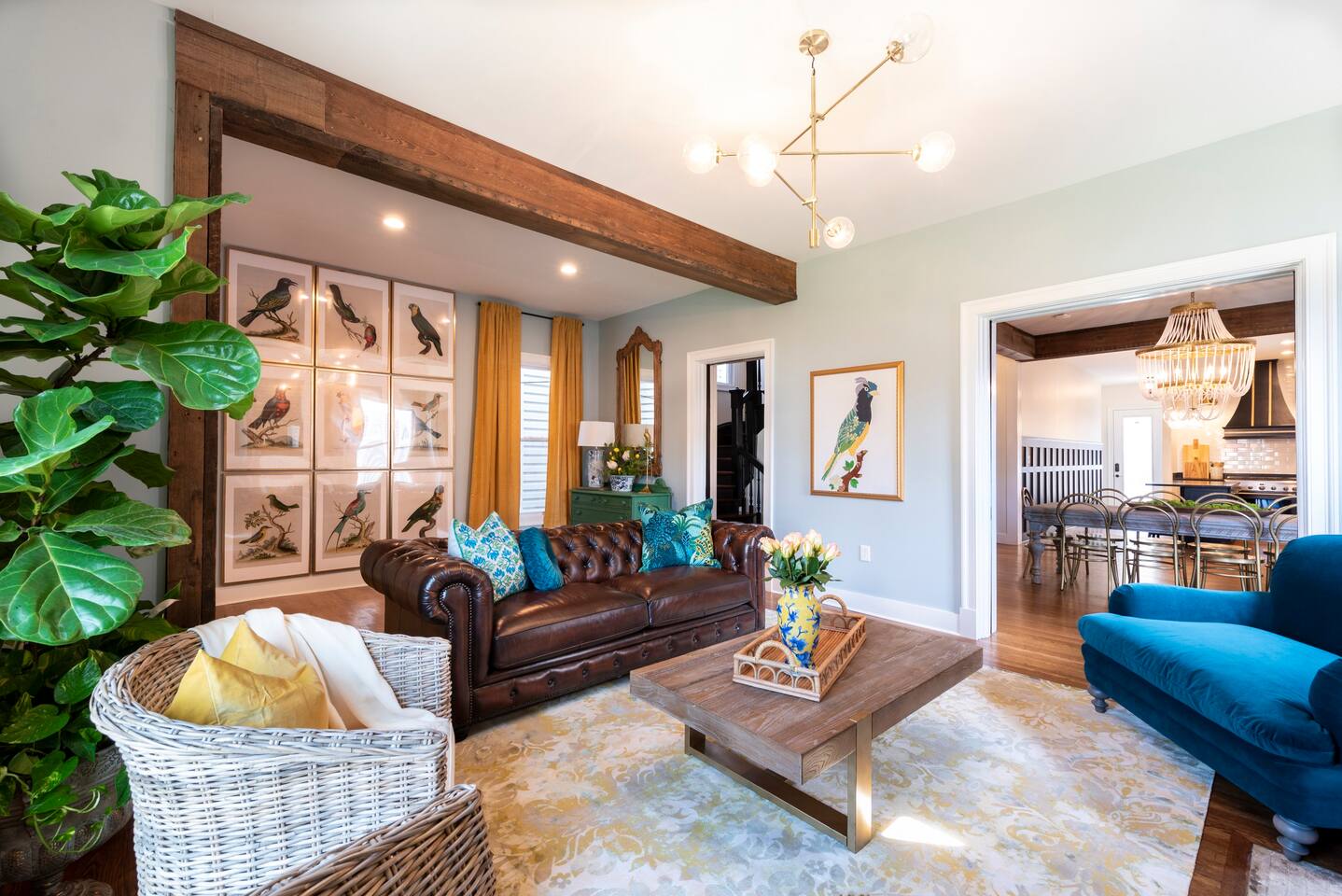 Living Room- First Floor, 65" Smart TV, Blu Tooth Speaker.