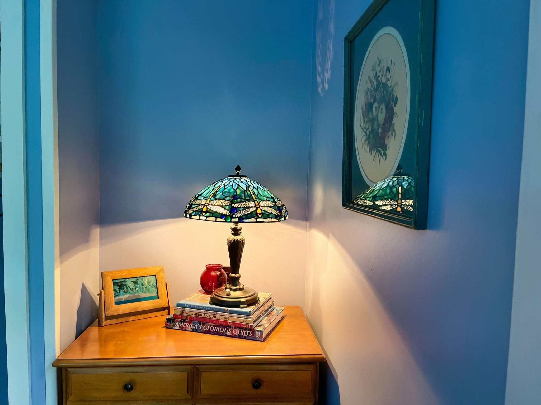 Big Pines tiffany lamp and reading books.