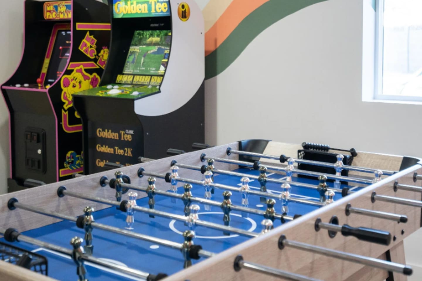 A classic foosball table adds a little friendly competition to the mix.
