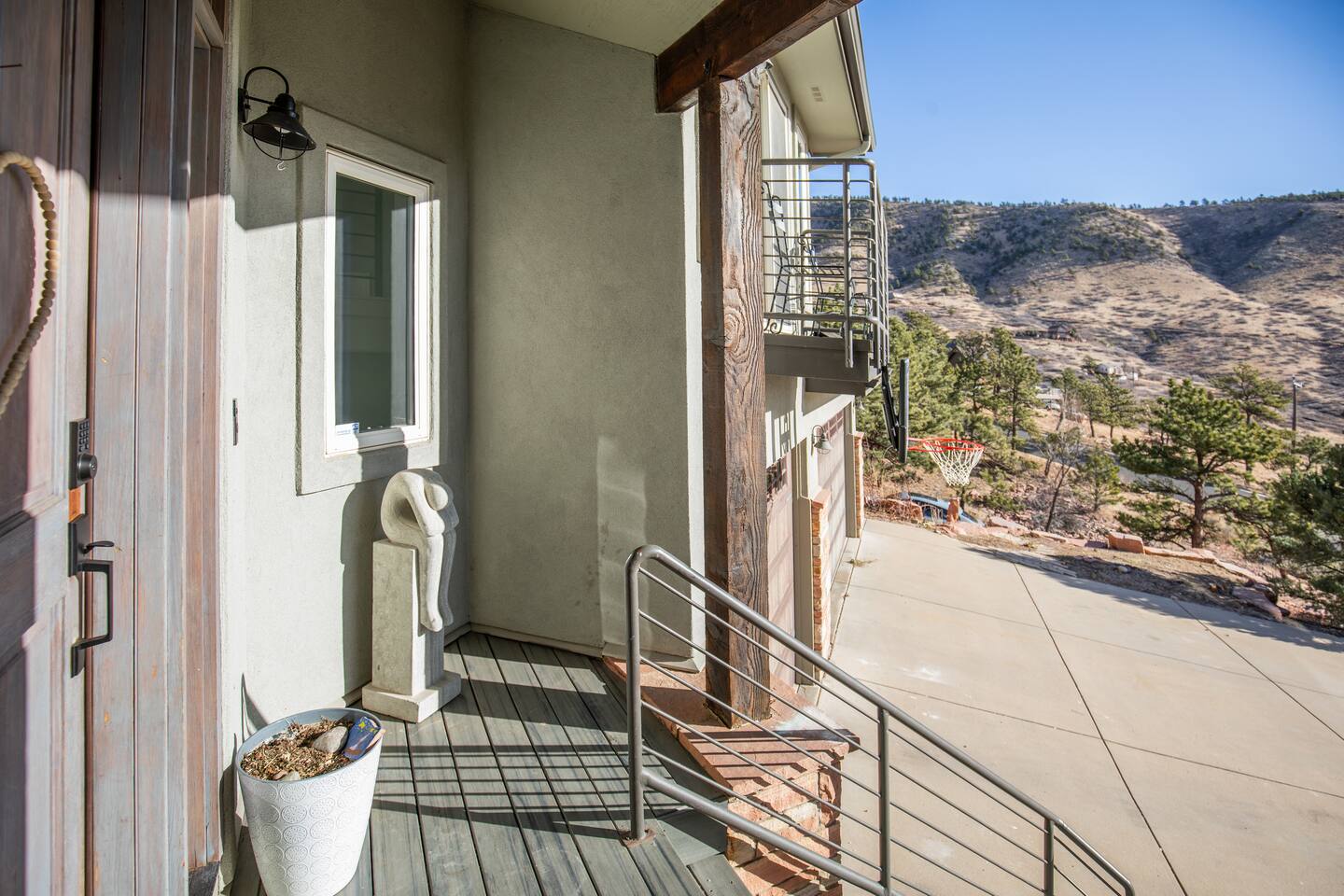 Welcoming steps lead up to the front door, inviting you into a warm and charming home