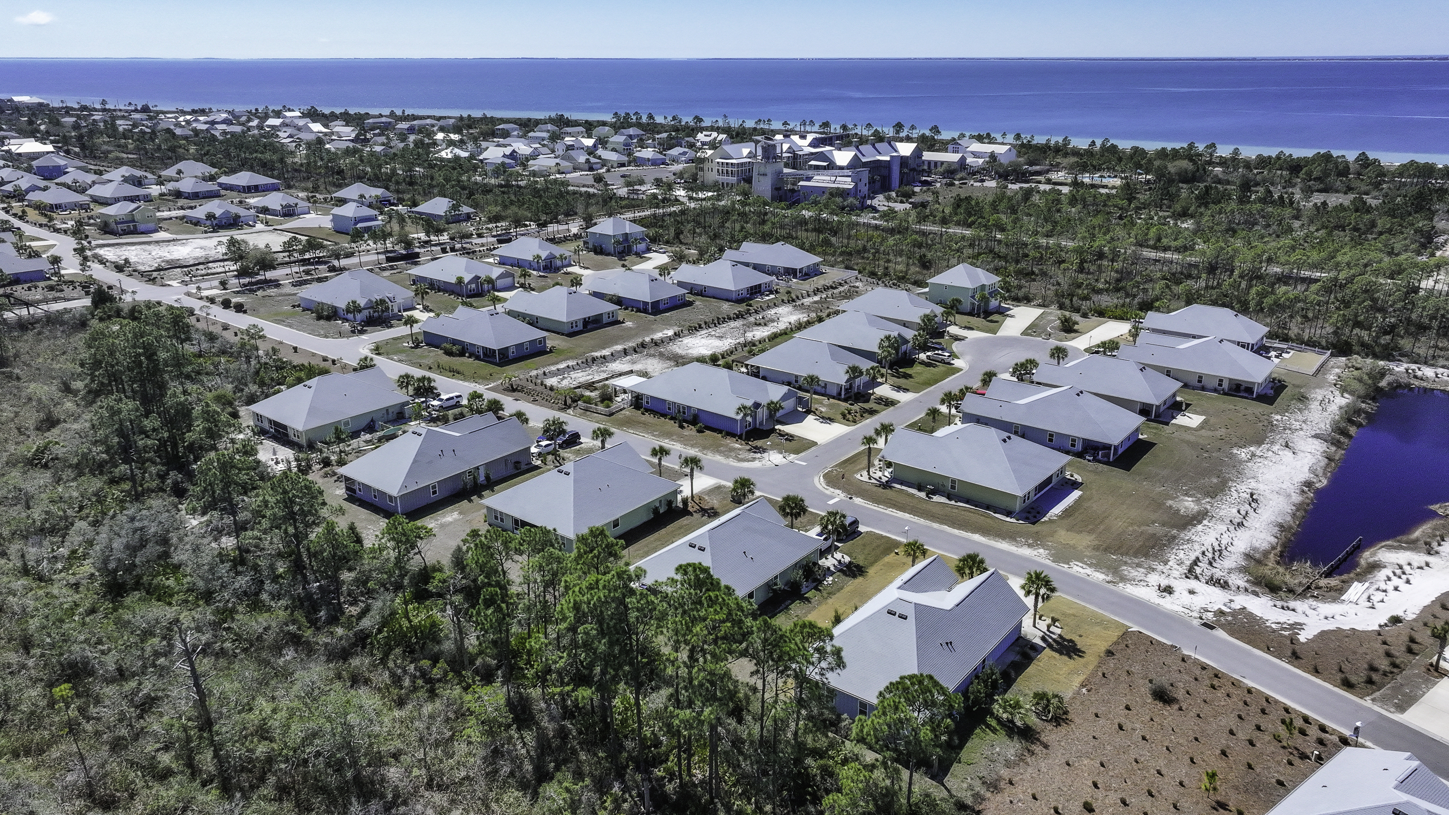 Conveniently located within walking or golf cart distance to the town center, pool, playground, and beach.
