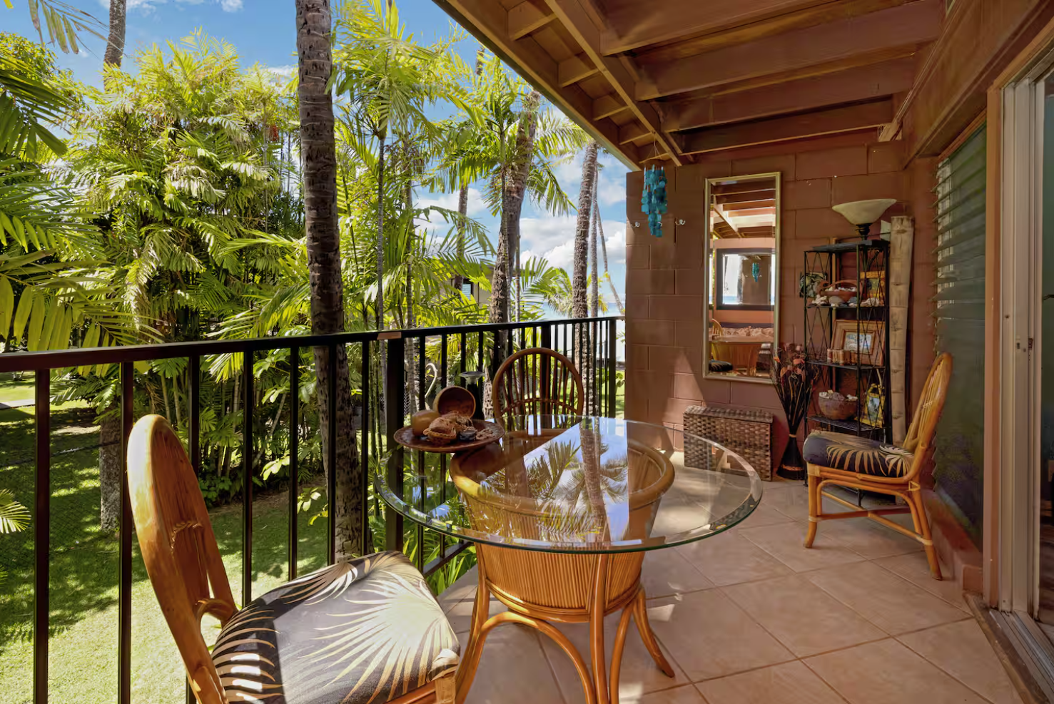 Lanai with garden and partial ocean view