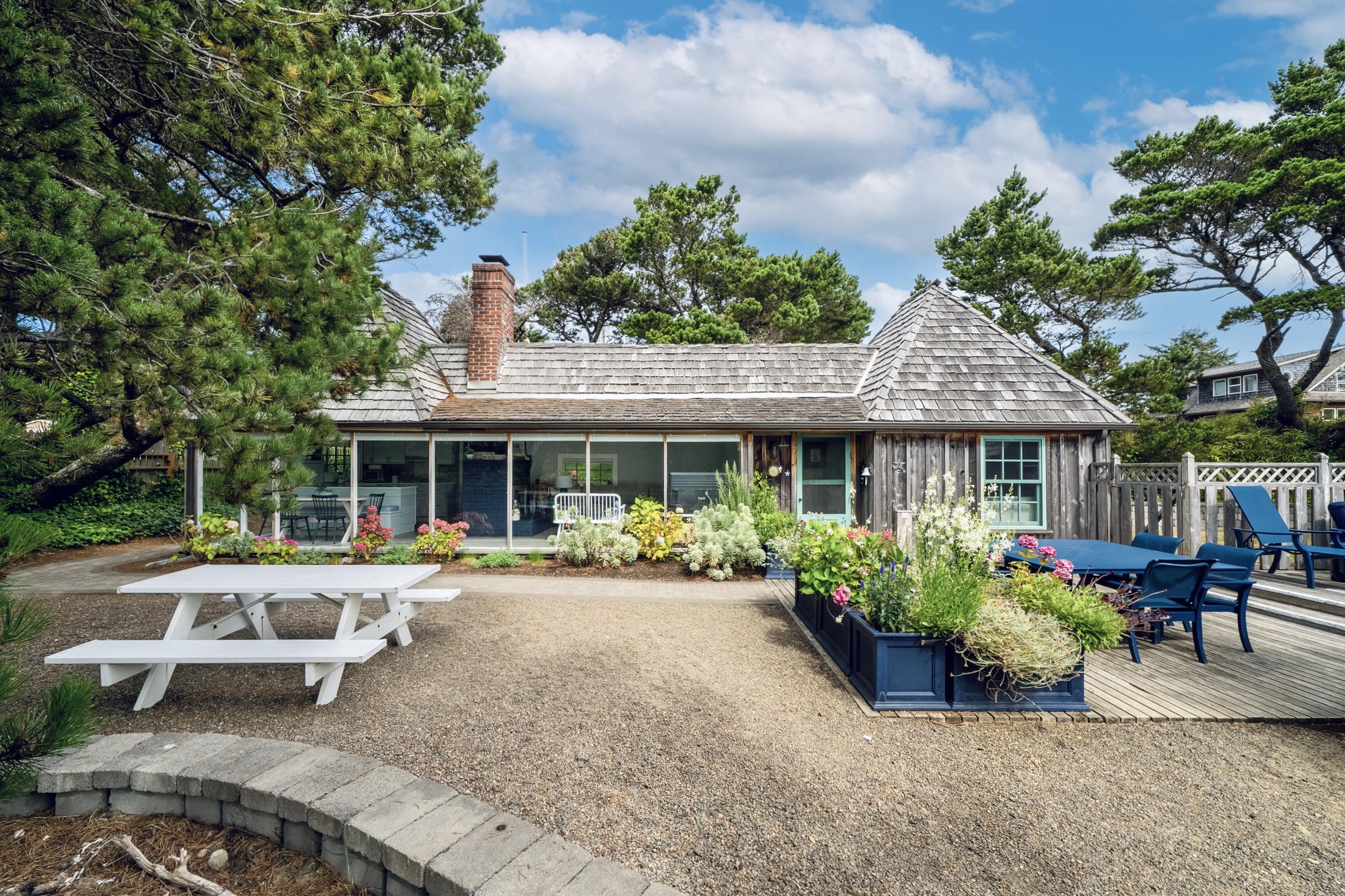 BACK SIDE SHOWCASING FLOOR TO CEILING WINDOWS  private + fully fenced