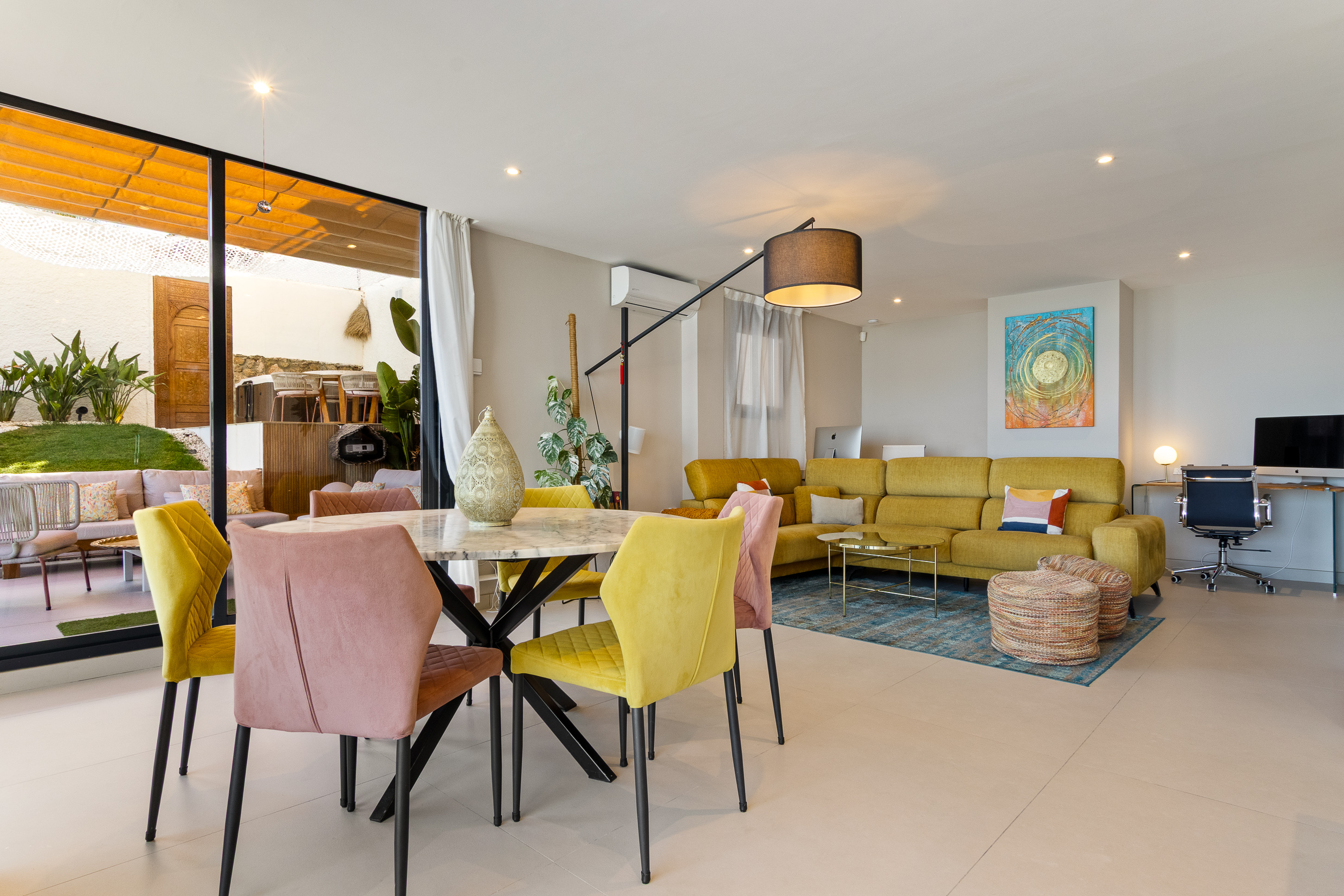 Stylish dining and living area connected to the outdoor space