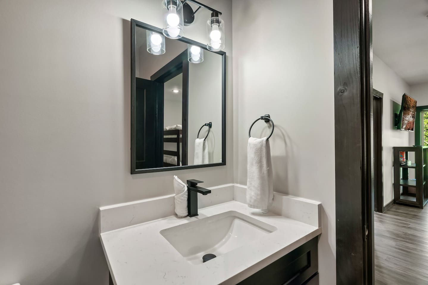 Lower-level half bathroom for added convenience.