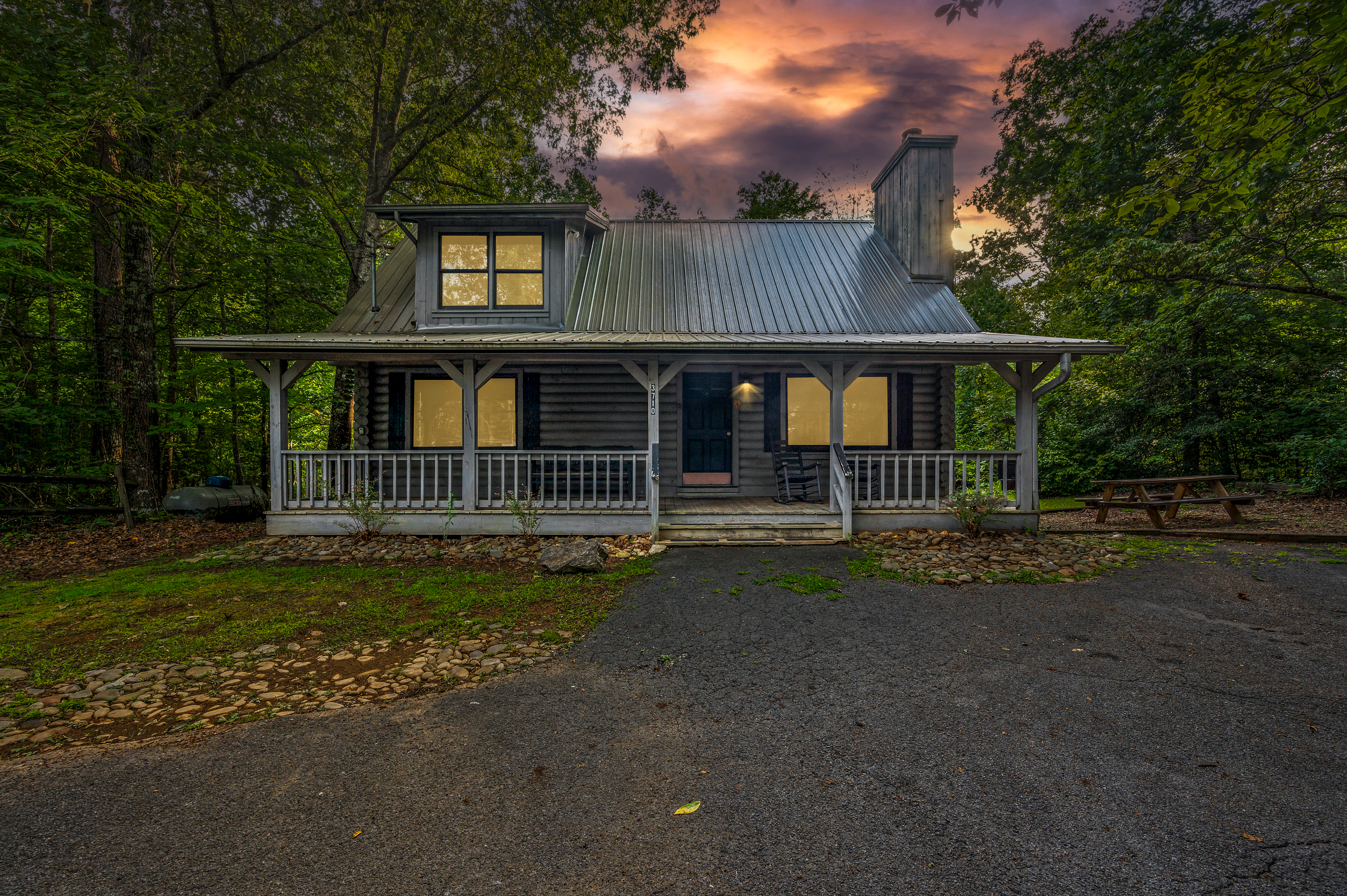A welcoming porch and breathtaking sunset.