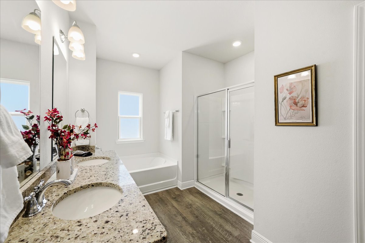Primary bathroom: Dual sinks with Soaking tub and walk in shower
