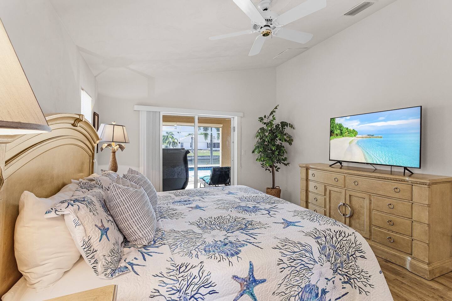 Serene and inviting primary suite with coastal touches, ideal for restful nights!