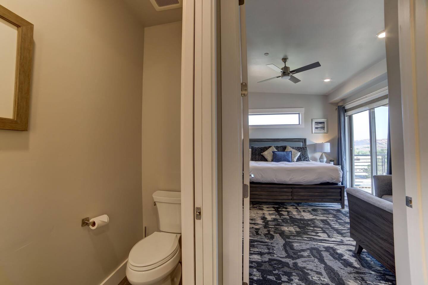 hallway half bath and master bedroom