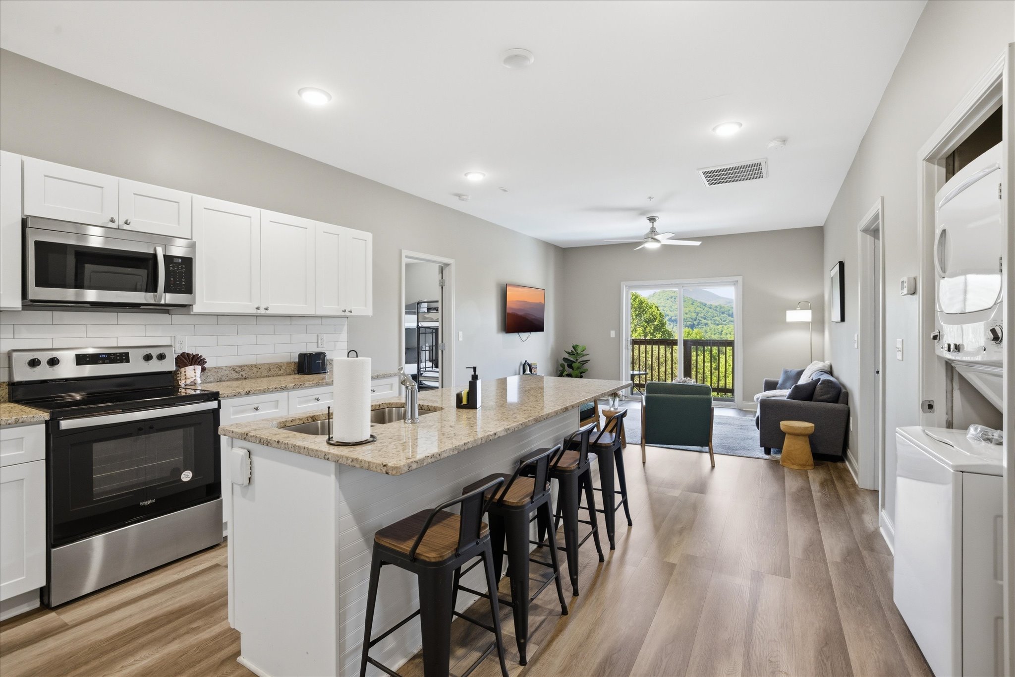 Take a seat and stay in the flow—up in Unit 4, this spot keeps you connected to the kitchen and living space, whether you’re grabbing a quick bite or hanging around a little longer.