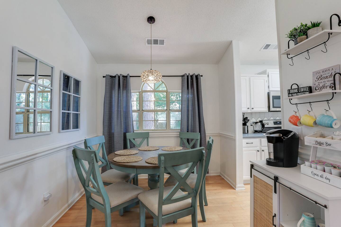 Gather around the dining table with seating for six, perfect for shared meals and memorable conversations.