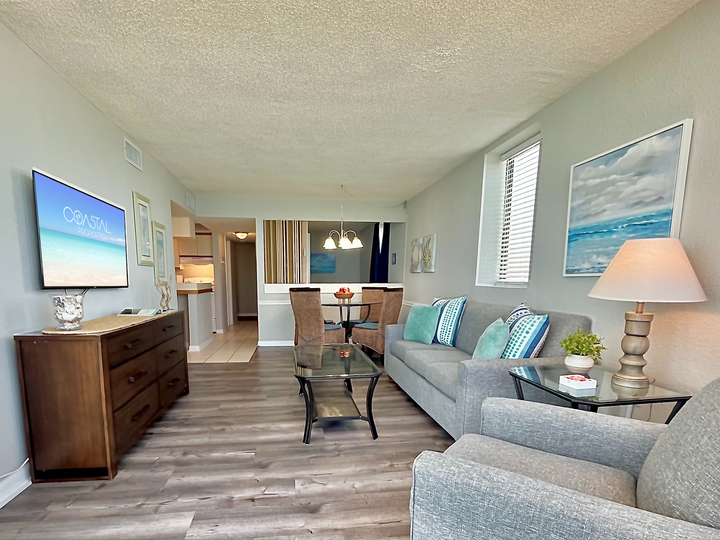 Seaside sophistication meets comfort in this living space!