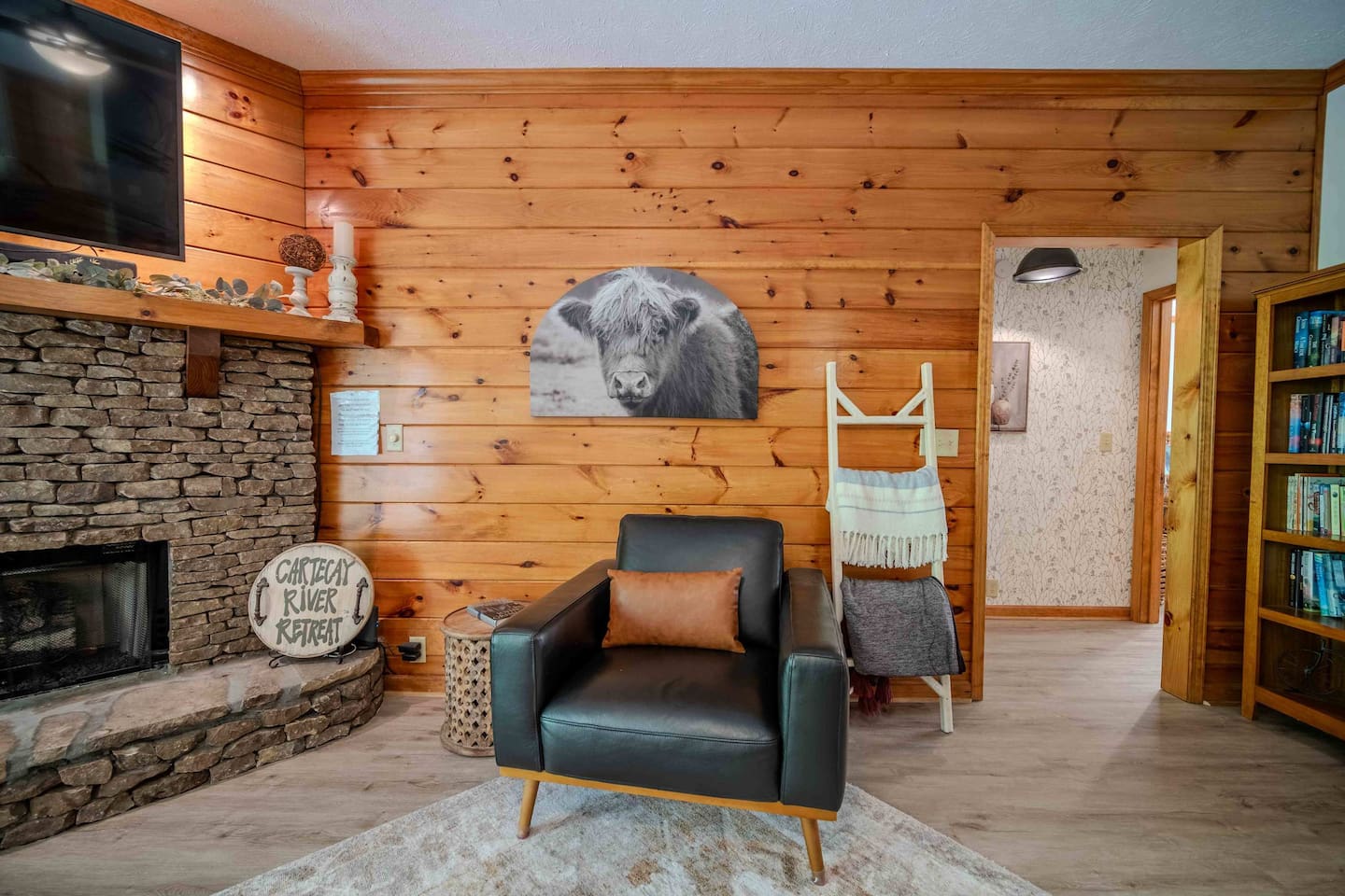 Perfect spot to cozy up next to the gas fireplace with a book from our collection of books