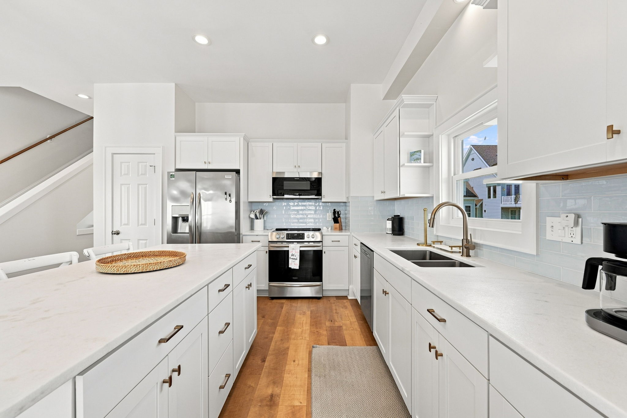 A chef-inspired coastal kitchen featuring modern updates, spacious countertops, and plenty of room to prepare family favorites. From beach snacks to seafood feasts, this kitchen is made for vacation moments.