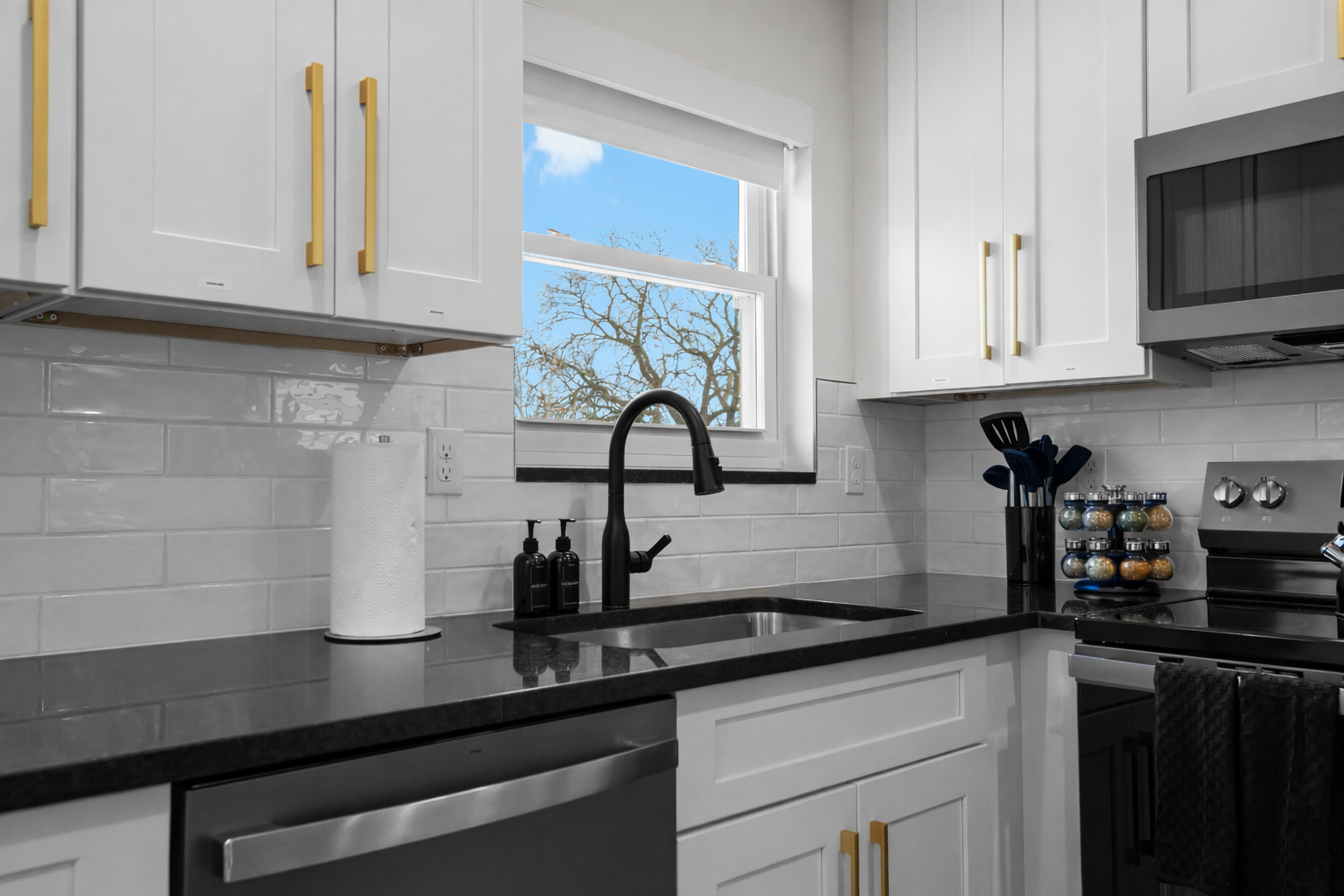 Bright, modern kitchen with sleek countertops, stylish cabinetry, and natural light—perfect for easy meal prep and everyday cooking.