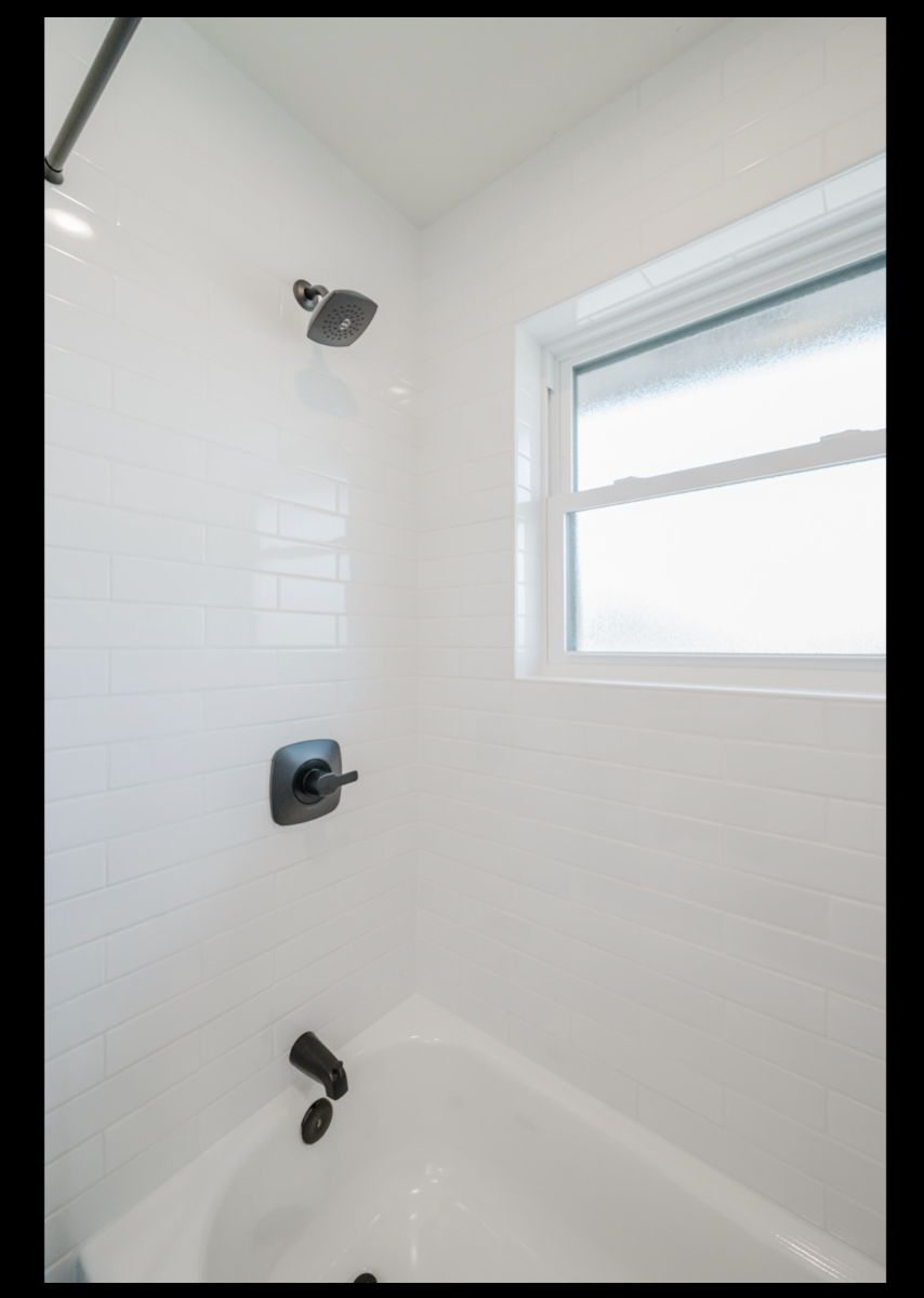 Enjoy a hot shower with excellent lighting through the frosted window.