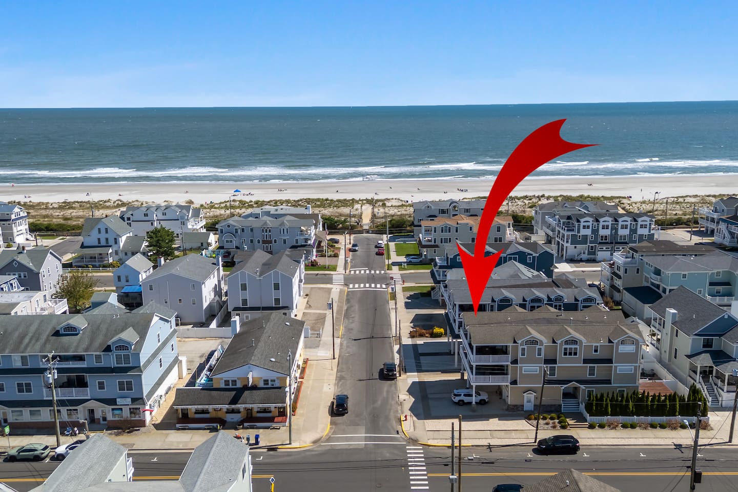 Aerial view of property only a short walk to beach. 