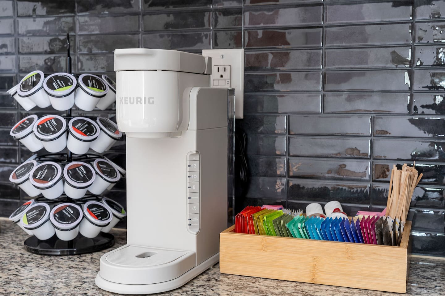 Start your day with a fresh brew using the Keurig coffee maker, complete with a variety of coffee pods and tea options. 