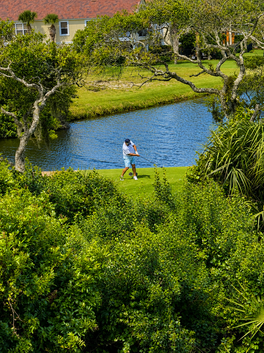 Tee time is only steps away. Picture unhurried mornings on the fairway, a friendly wager between family, and the satisfying click of a well-struck drive carrying out over the water. Golfers of every age find their happy place on this scenic course.