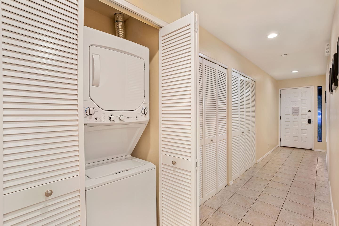 Your in-suite laundry and lots of hall storage. We supply laundry soap and fabric softener