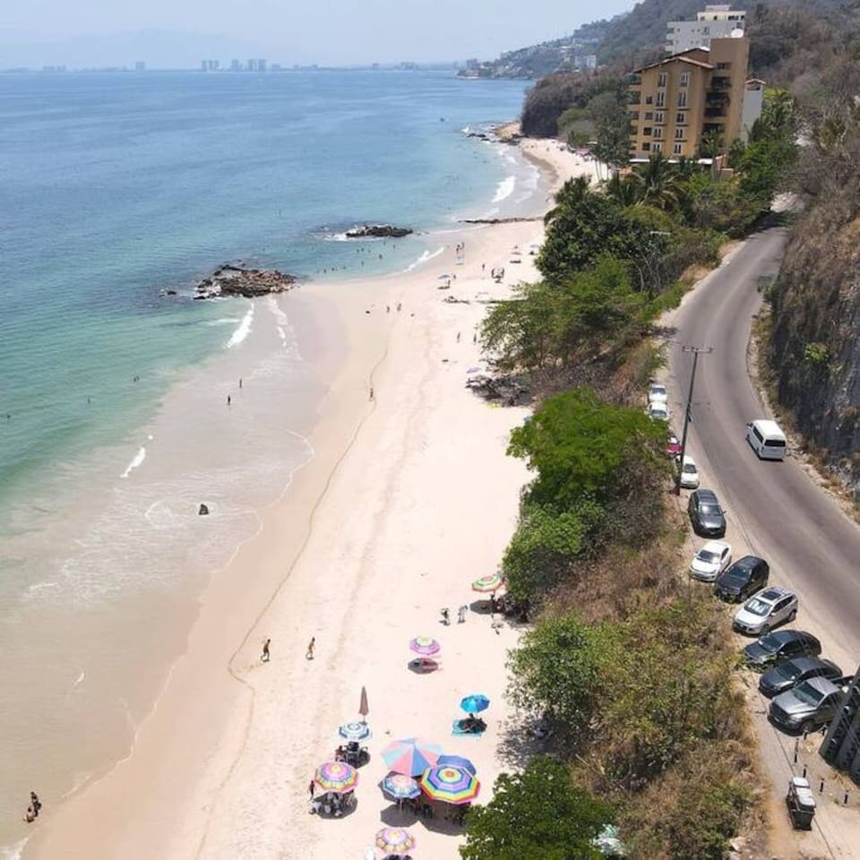 Palmares Beach is only a 12 minute walk or 3 minute drive from our front door. 950 meters
