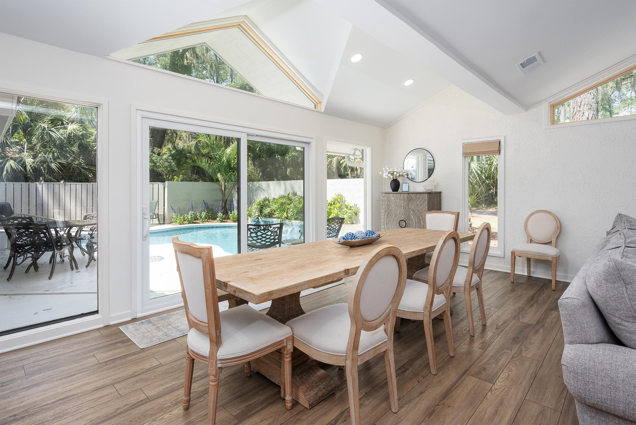 Dining room with seating for 10 with great pool views