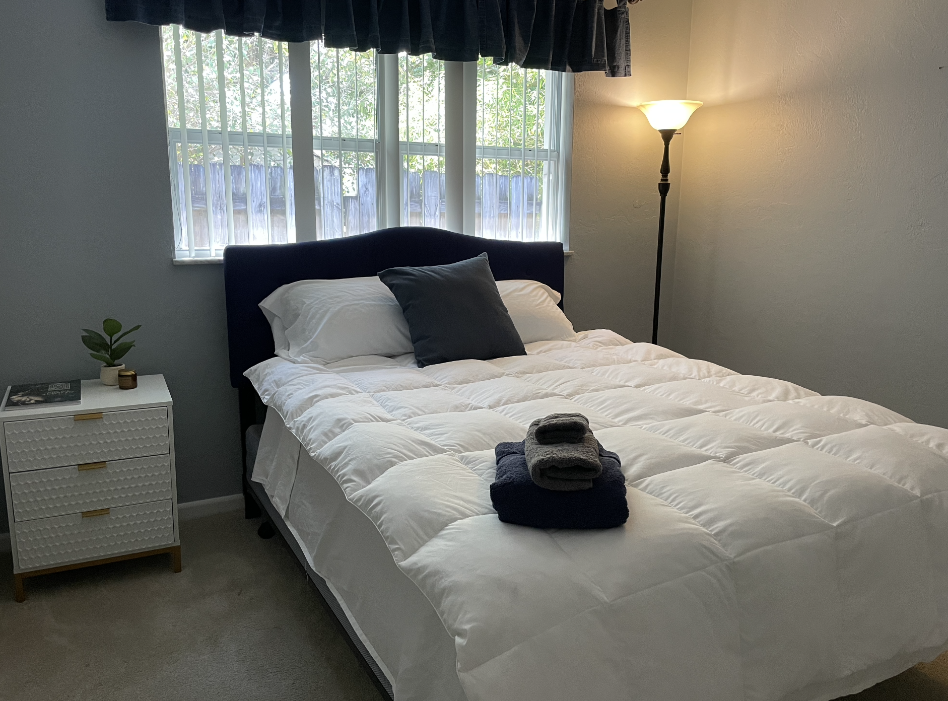 Our second bedroom is comfortable with plenty of closet space.