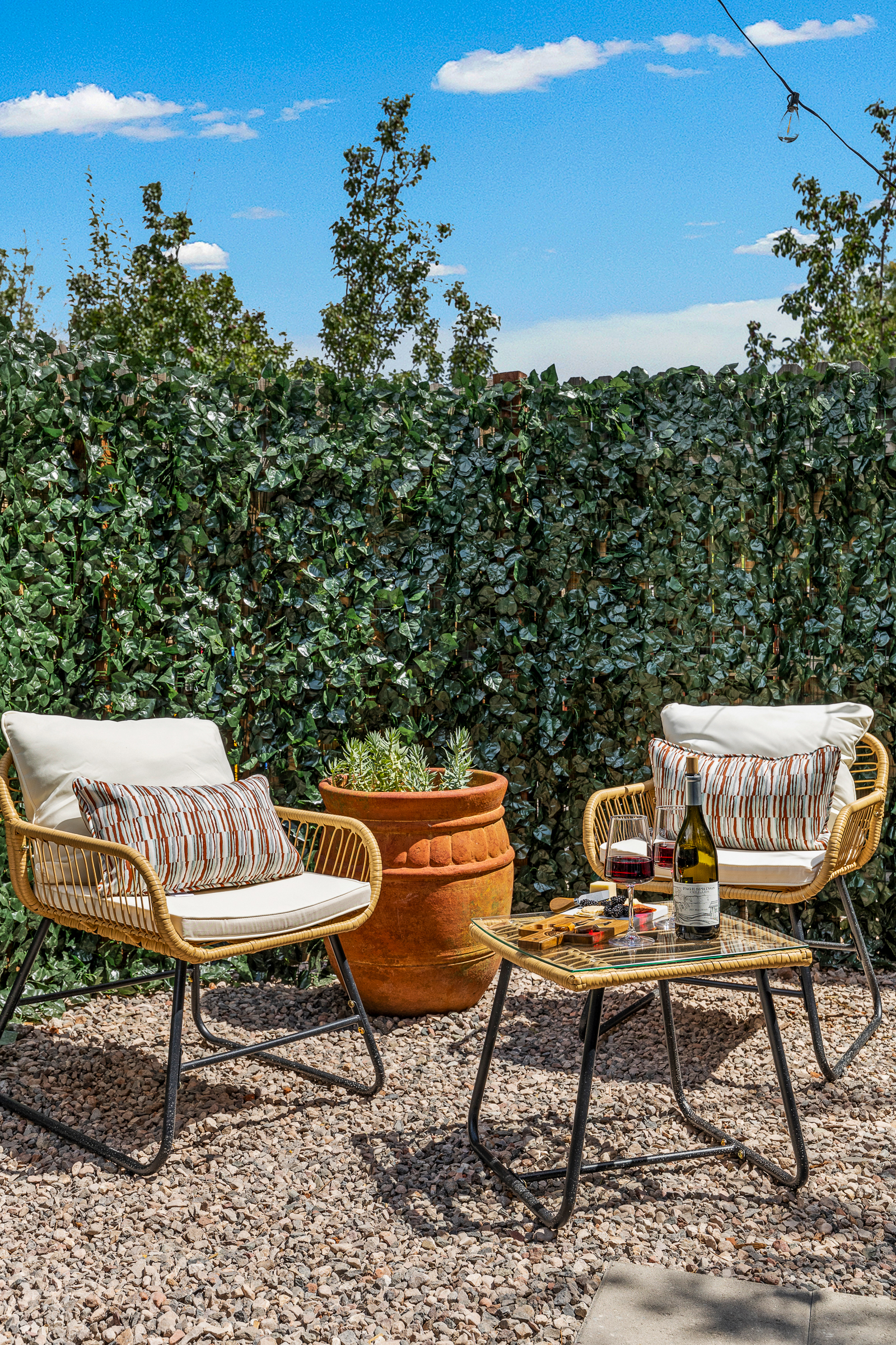 Share a bottle of wine, or simply slow down together in this peaceful garden nook designed for presence and reconnection.