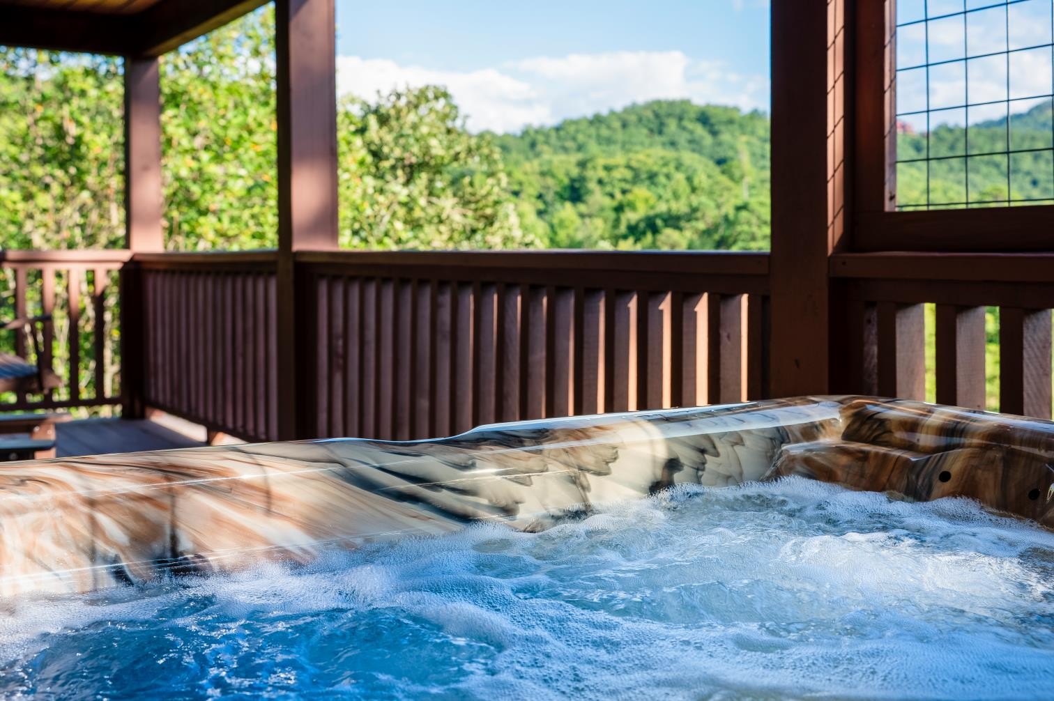 Your front-row seat to the mountains. Unwind in the private rear-deck hot tub and take in the panoramic views.