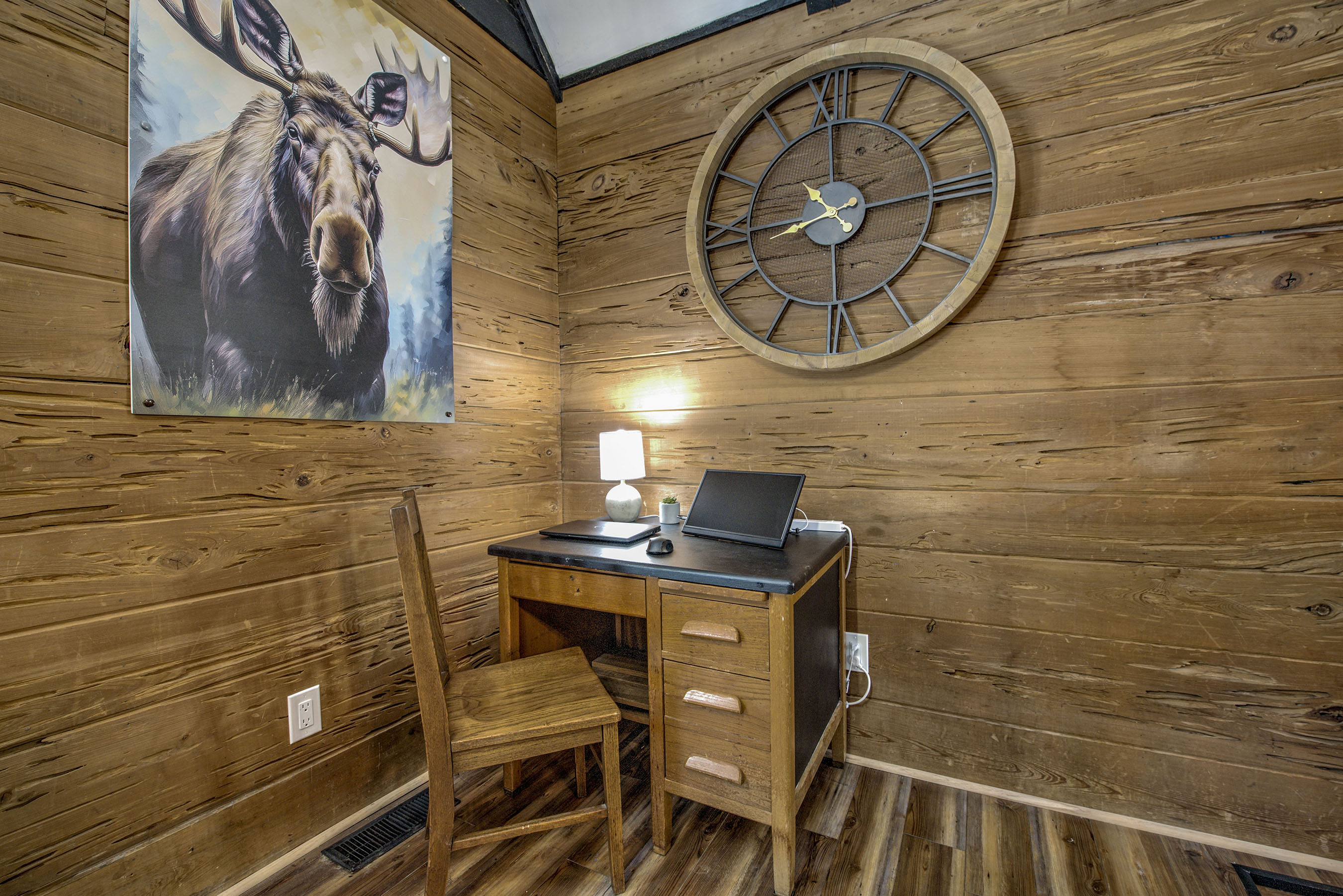 Catch up on work in your cozy nook—warm wood walls, a quiet desk, high-speed internet, and a peaceful space designed for you to focus and make it yours.