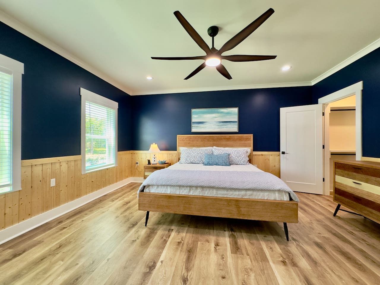 This welcoming bedroom offers comfort, style, and room to unwind.