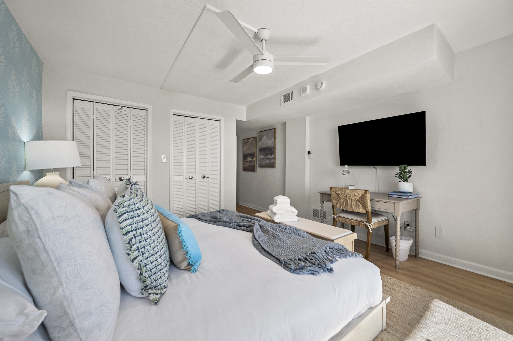 Recharge in comfort with a plush king bed, your favorite shows on a flat-screen TV, and a quiet workspace for when duty calls.