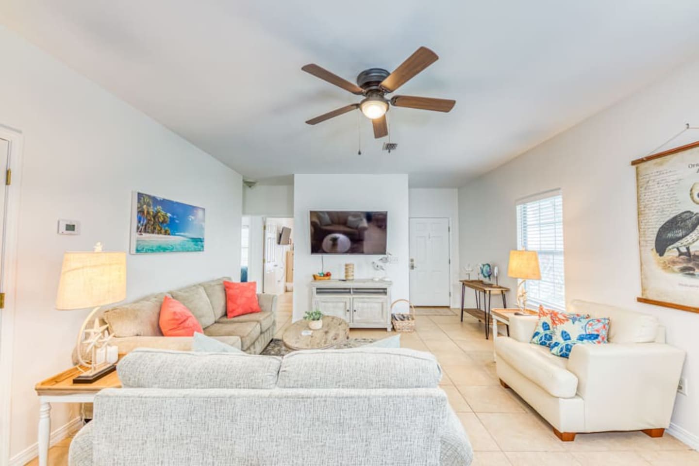 Living Room: Bright space featuring plush sofas, vibrant decor, and a perfect spot for movie nights!