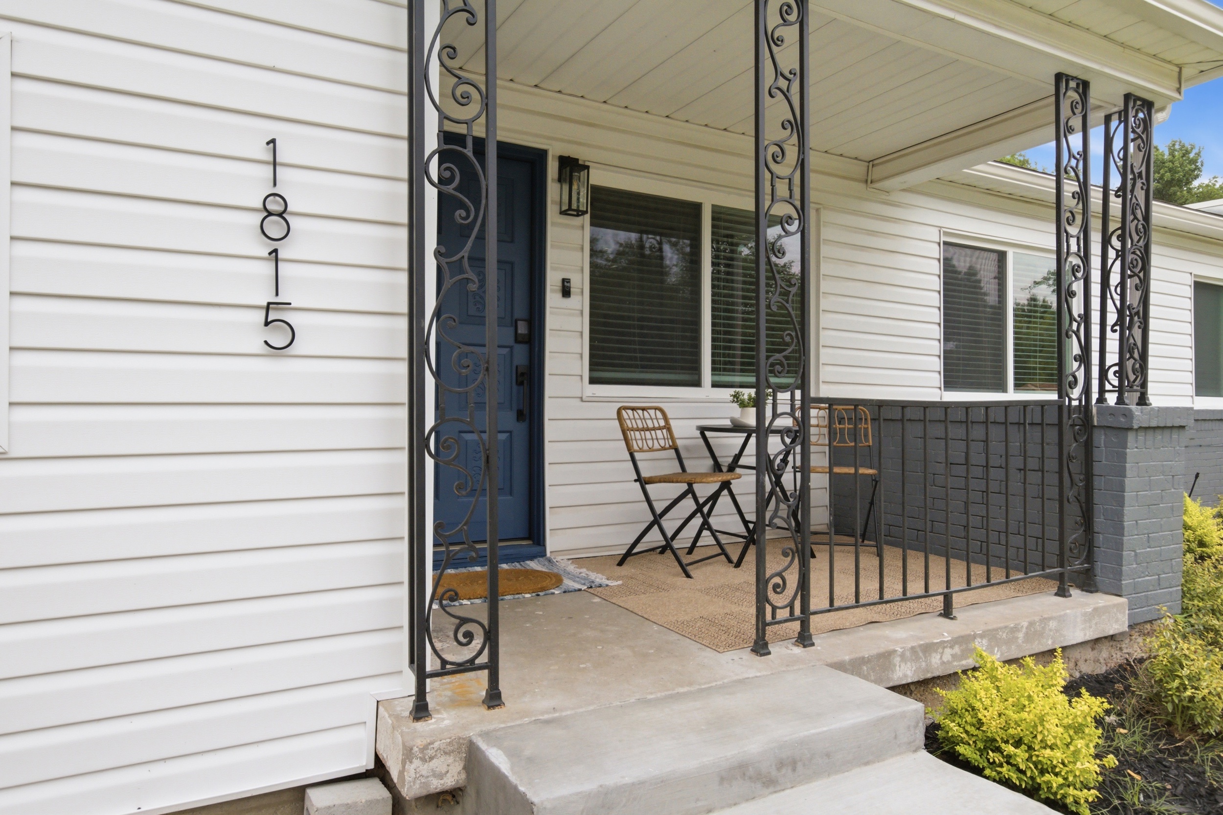 Welcoming Front Porch with seating and classic Texas curb appeal. Easy arrival and check-in for your Arlington stay.

