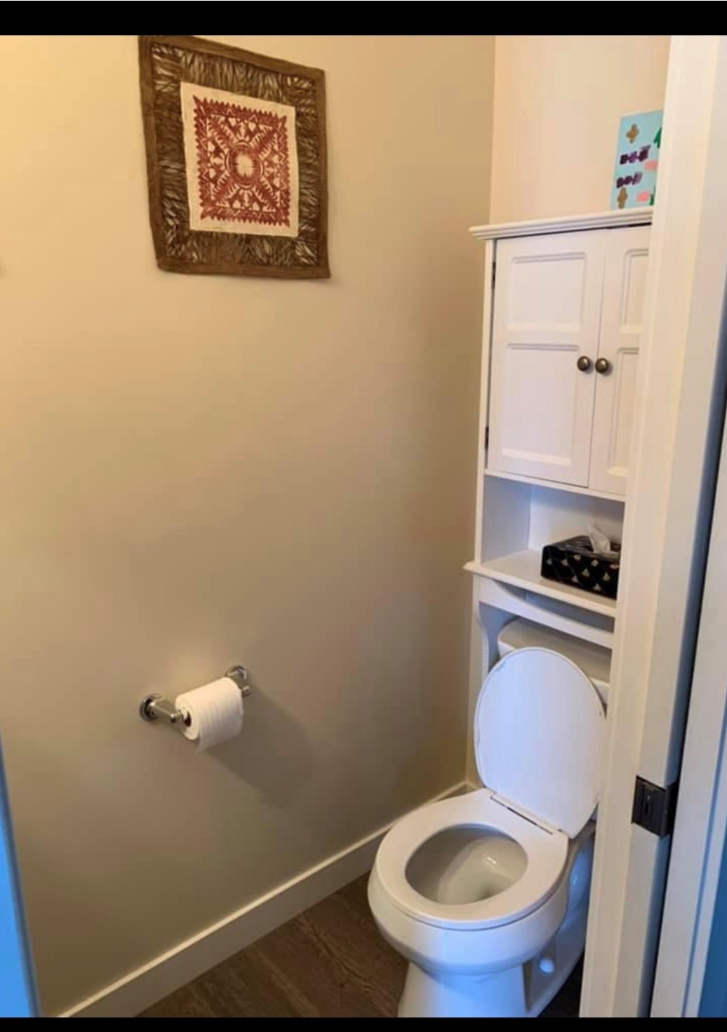 Private water closet on main floor off of the kitchen. 