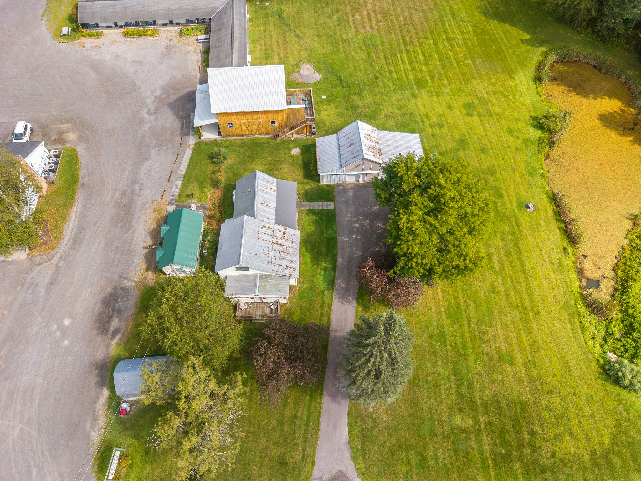 An aerial view of the neighboring 1825 rentals and their shared grounds.