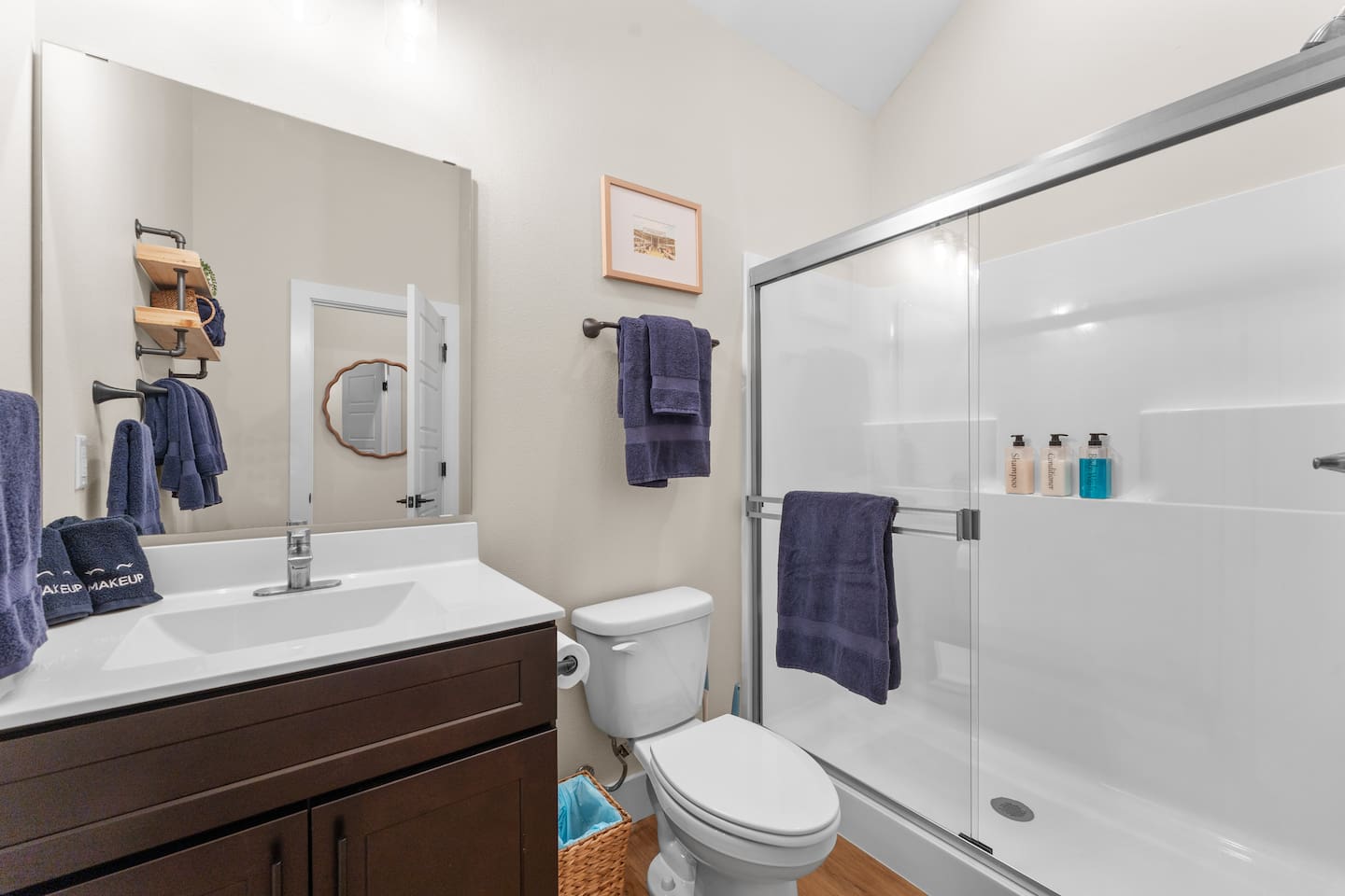 Bright, clean shower with fresh towels