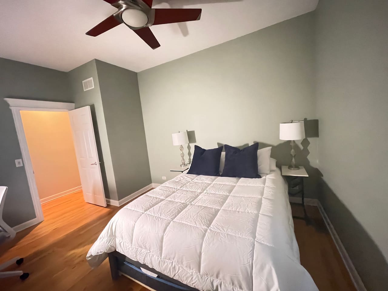 Comfortable bedroom setup designed for quiet sleep, with a trundle bed that slide from under  providing flexible sleeping arrangements for groups