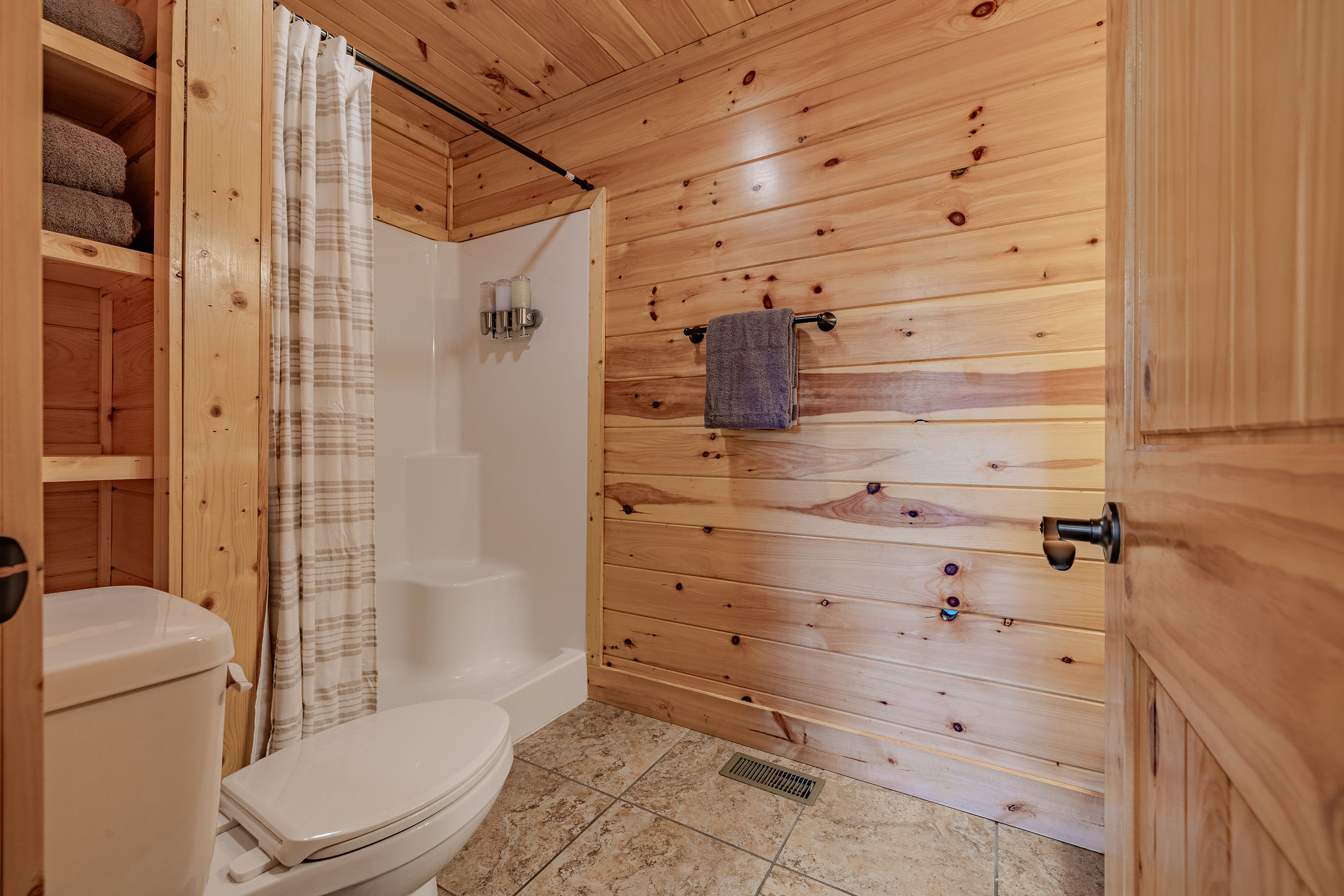 The Rhythm Suite Ensuite Bathroom serves the lower-level king suite, creating a private retreat close to The Soundstage Cinema and Afterparty Deck.