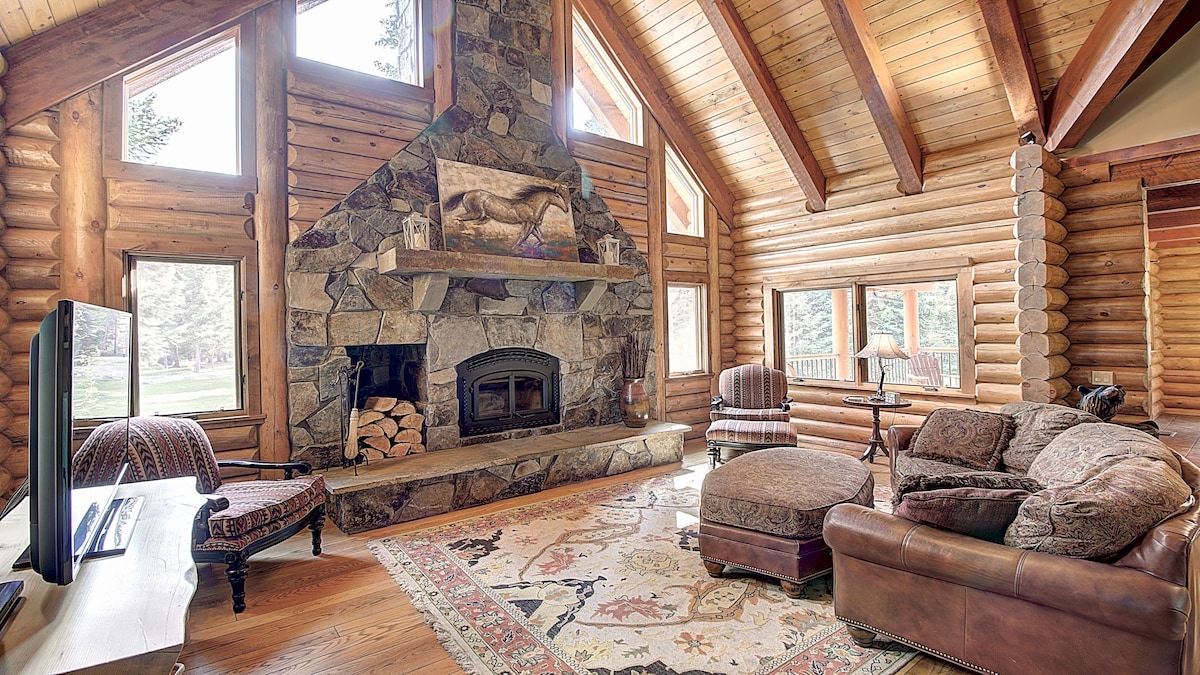 upstairs family room with fireplace, flat screen TV w/ sports package