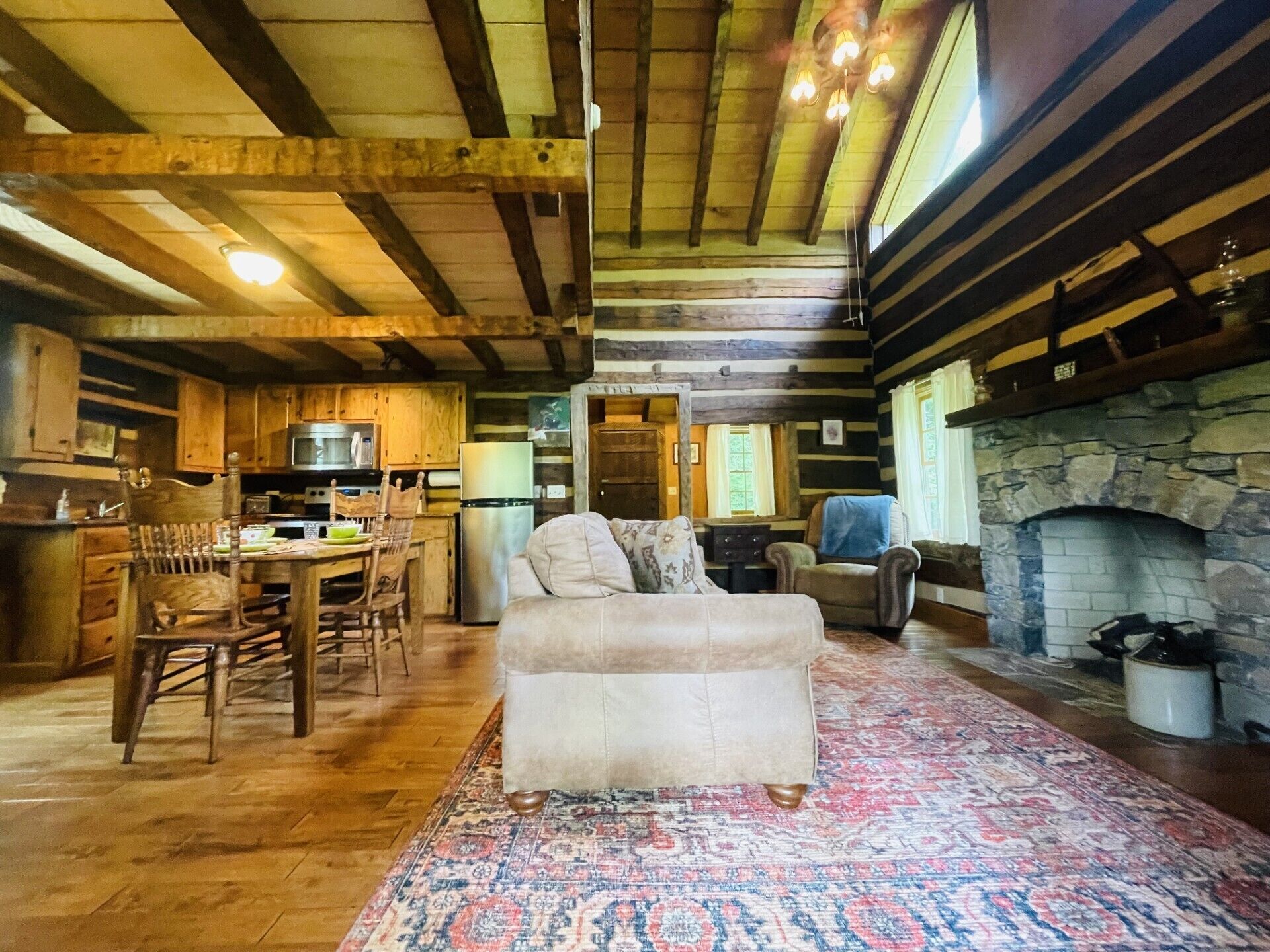 Enter in to this sweet rustic cabin with all the creature comforts to chill!
